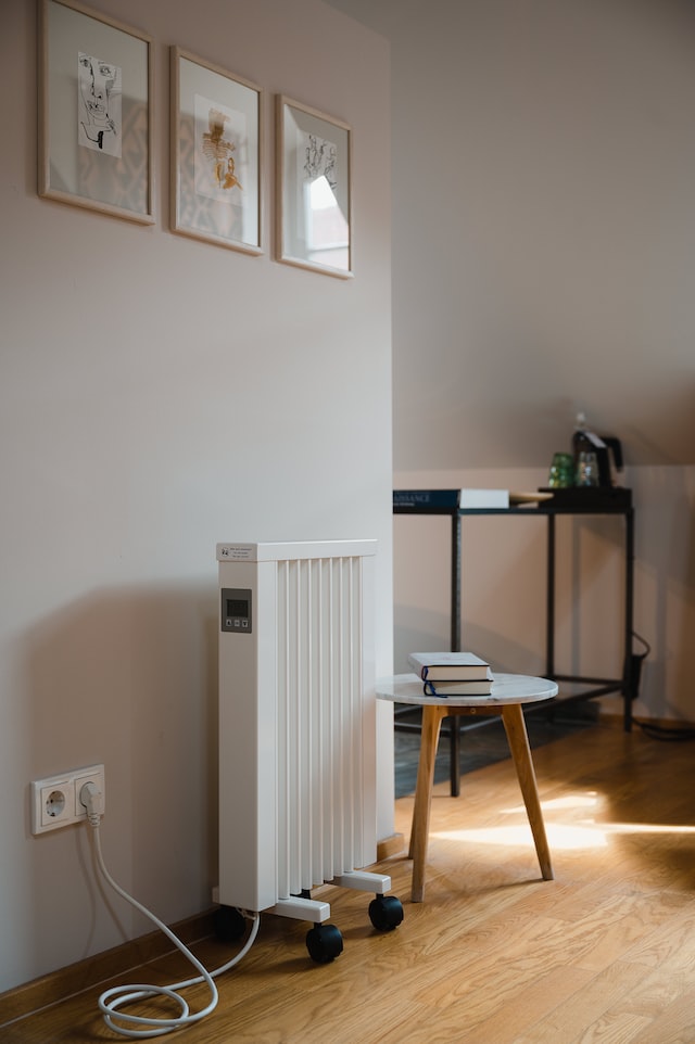 white german radiator next to white wall
